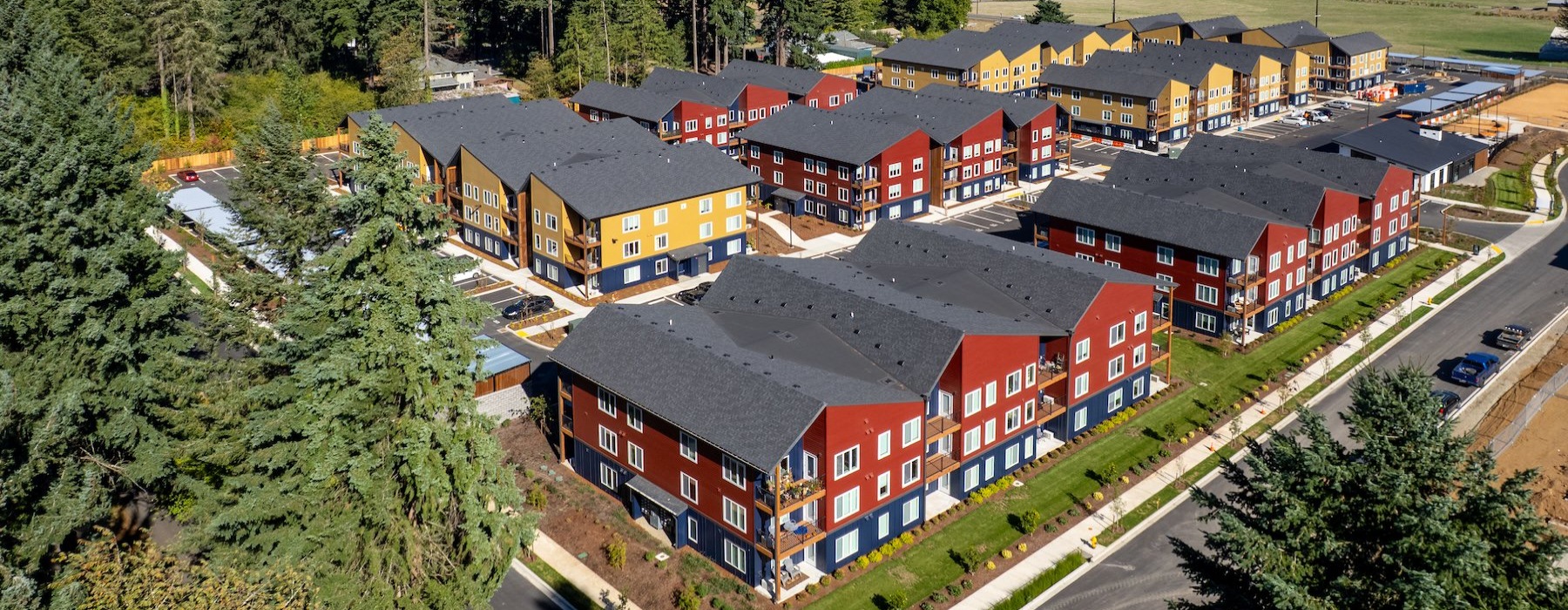 an apartment complex with trees